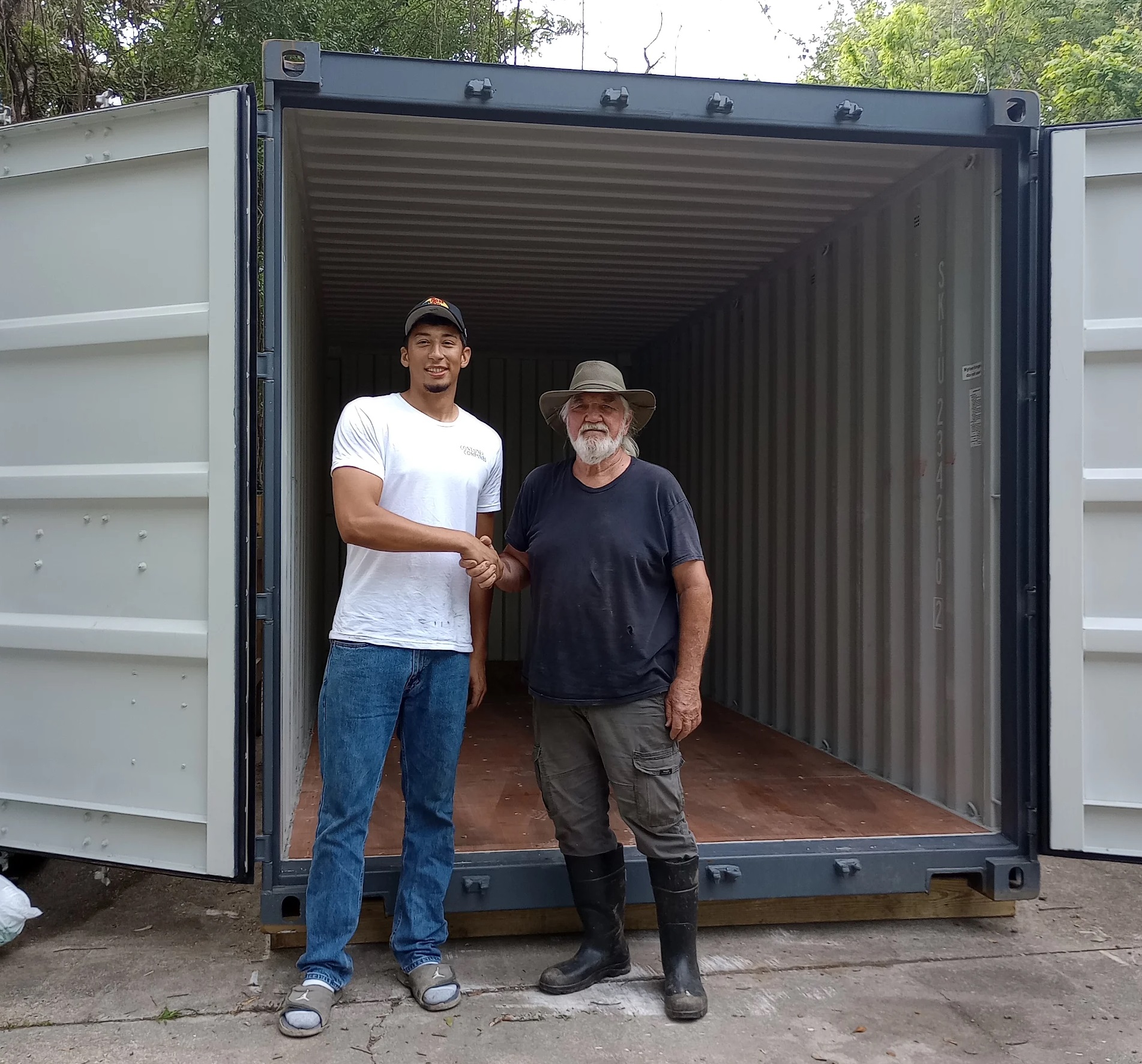Shipping container being placed on a customer site